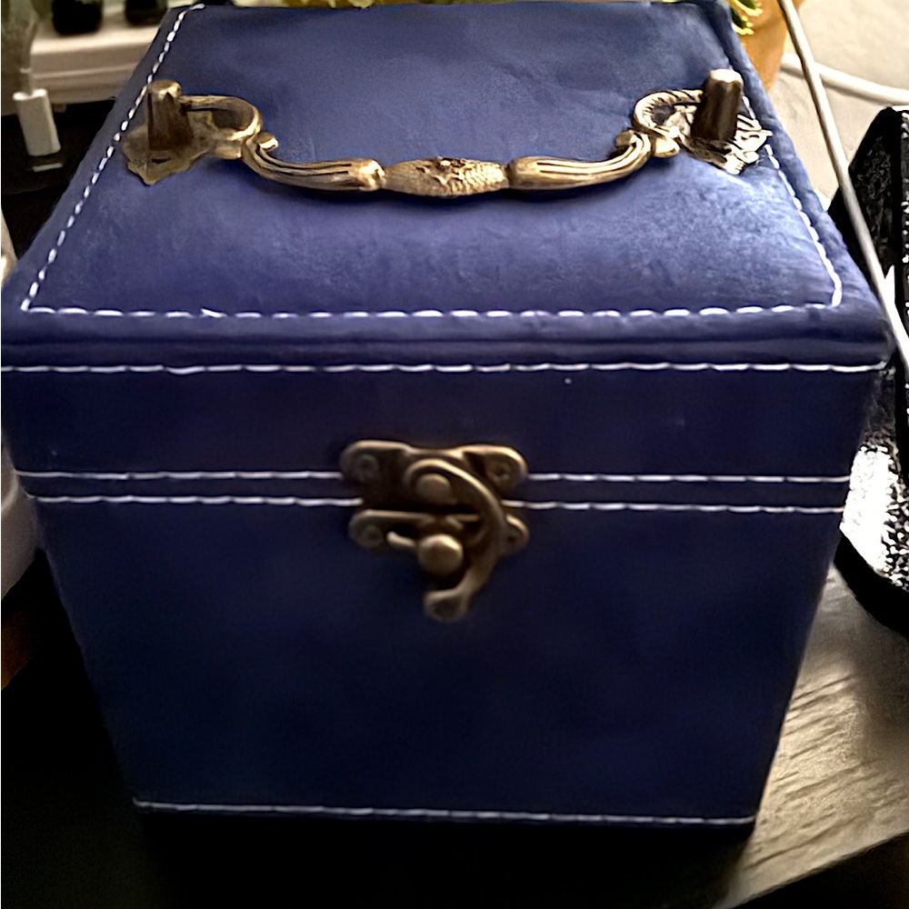 Elegant Blue Jewelry Box with Gold Accents